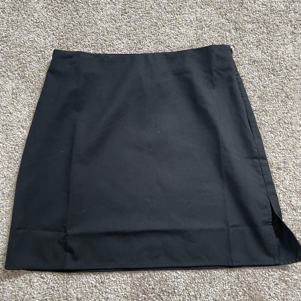 adorable black mini skirt with small slit